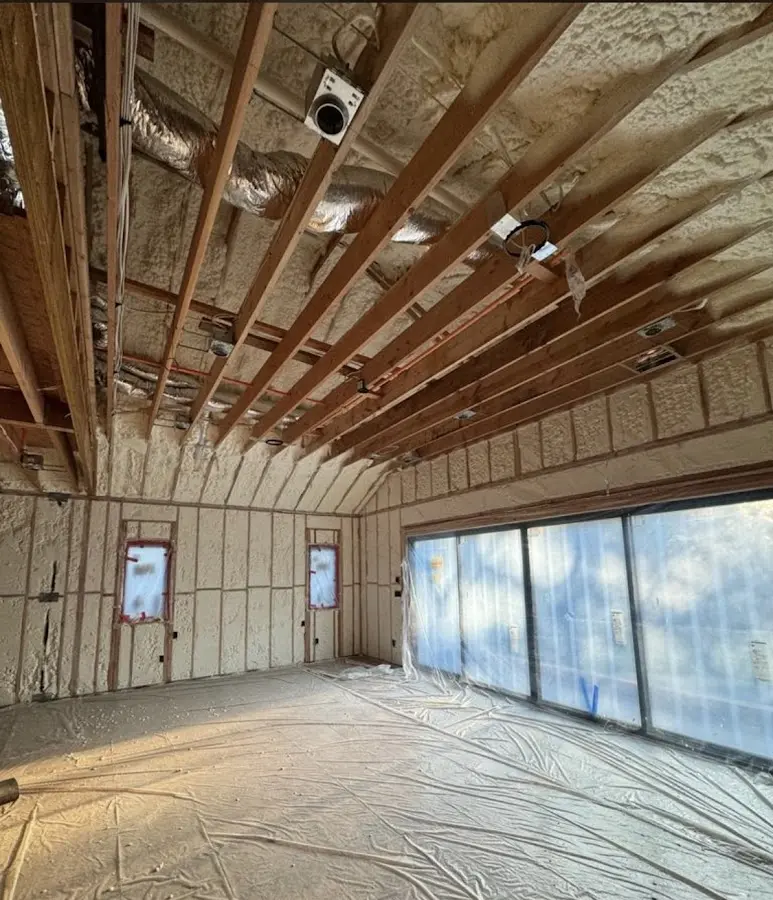 Interior walls and ceiling insulated with spray foam during new construction in Dacula